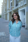 Casual sophistication with our Teal Vertical Striped Button-Down Shirt